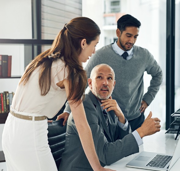 Three expats at work